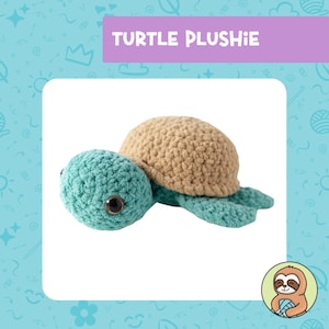 May include: A crocheted turtle plush toy with a light brown shell and a teal green body. The toy has black eyes and a friendly expression.