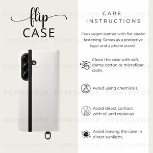 May include: White flip phone case with a black elastic strap and a metal D-ring. The case has the words "flip CASE" in black script. Care instructions include cleaning with a damp cloth and avoiding chemicals, oil, makeup, and direct sunlight.