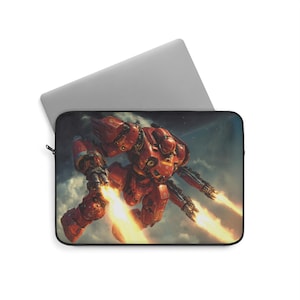 May include: Laptop sleeve featuring a red robotic figure with flames emitting from its arms and legs, set against a cloudy sky. The sleeve is black with a zipper closure and a silver laptop is partially visible.