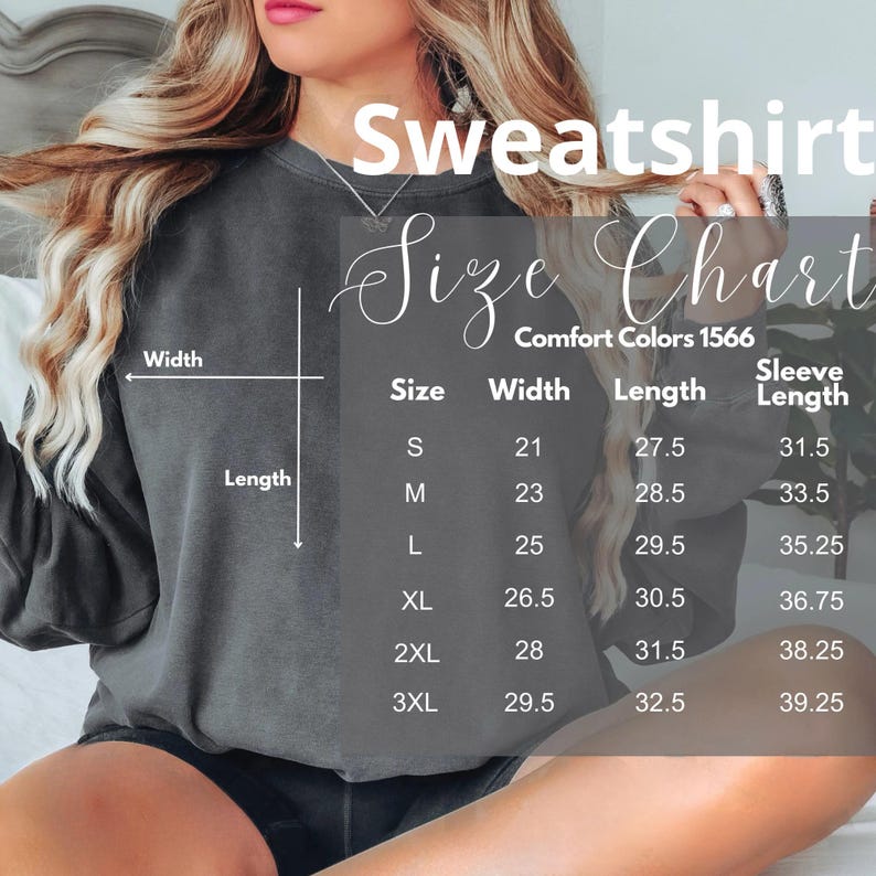 May include: A charcoal gray crewneck sweatshirt with a size chart overlay. The text reads Sweatshirt Size Chart Comfort Colors 1566, listing sizes S through 3XL with corresponding width, length, and sleeve length measurements in inches for each size.
