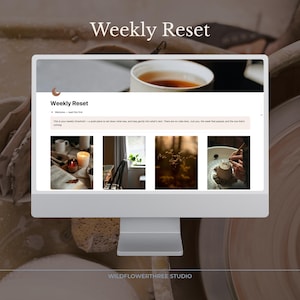May include: A computer monitor displays the text "Weekly Reset" with a website interface featuring images of tea, candles, and pottery. The monitor is set against a neutral background with pottery tools and a pottery wheel.