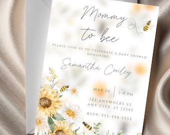 Puede incluir: Una invitación a un baby shower con el texto "Mommy to bee" e ilustraciones florales y de abejas. La invitación incluye detalles del evento, como la fecha, la hora y el lugar, y el nombre de la persona homenajeada.