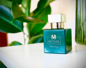 White cream. Eau de parfum. M E T E O R.