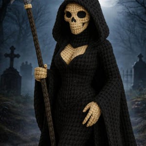 May include: A crocheted Grim Reaper figure, wearing a black hooded cloak and holding a scythe. The figure has a skull face and tan hands. The background depicts a graveyard with a full moon.