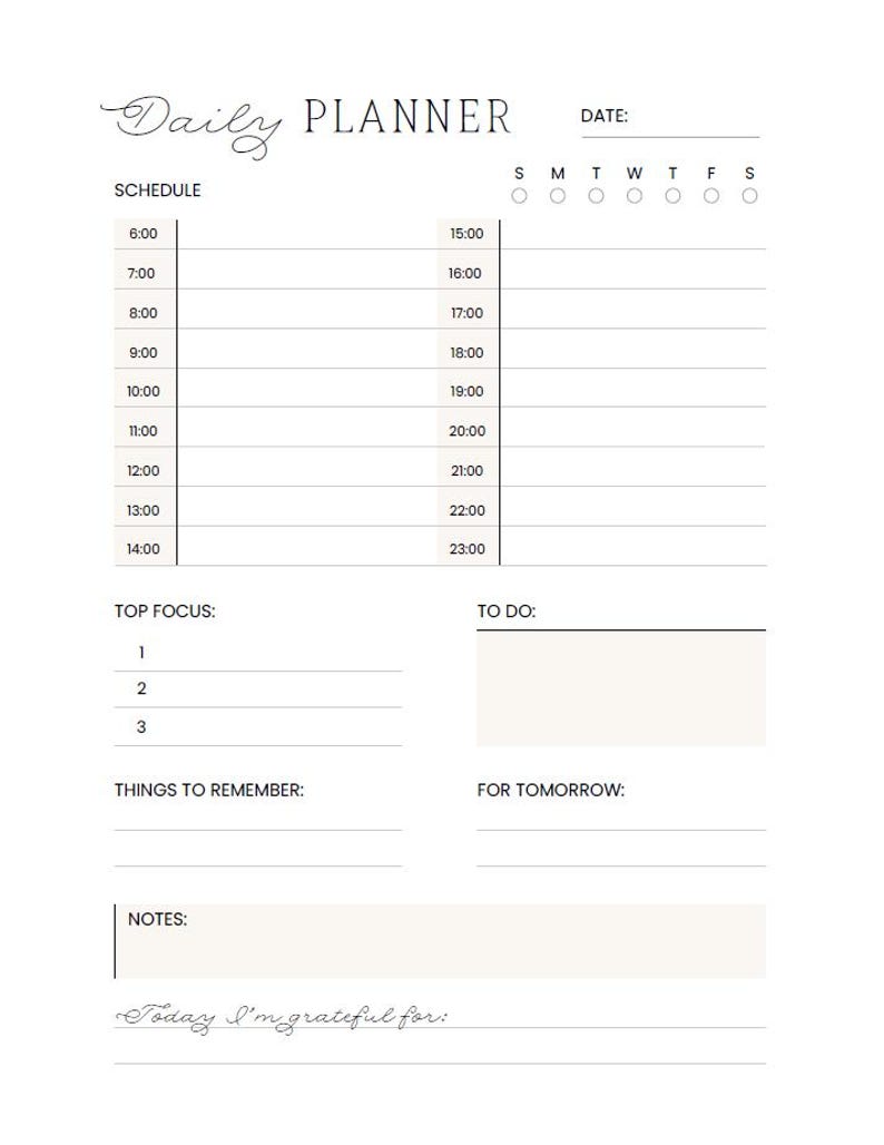 May include: A white Daily Planner with a schedule, to-do list, and space for notes. The planner includes sections for top focus, things to remember, and gratitude. The text "Today I'm grateful for:" is at the bottom.