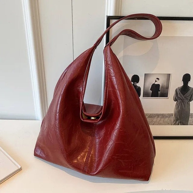 Leder Umhängetasche für Frauen Modische Handtasche mit großem Fassungsvermögen Bild 1