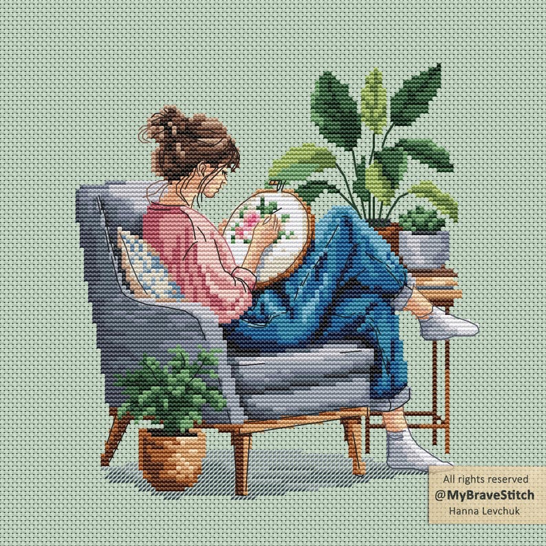 May include: Illustration of a person cross-stitching a floral design while seated in a gray armchair. The person wears a pink shirt and blue jeans. Potted plants are placed around the chair. The background is a light green color.