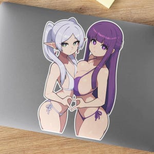 May include: Two anime characters, one with white hair and the other with purple hair, are wearing swimsuits and making a heart shape with their hands.