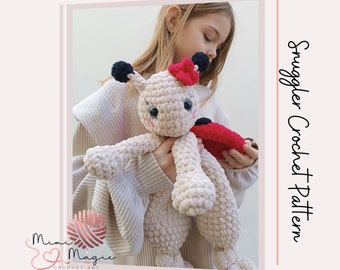 May include: A crocheted ladybug plush toy with a red and black shell, black eyes, and a red bow. The toy is being held by a child.