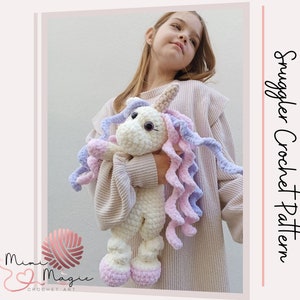 May include: A young girl holds a crocheted unicorn snuggle toy. The unicorn is white with pink and purple yarn accents. The toy is part of a crochet pattern.