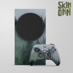 May include: A white ceramic mug with a black handle and the text "But first, coffee" in a handwritten style. The mug is on a white surface. The mug is approximately 4 inches tall.