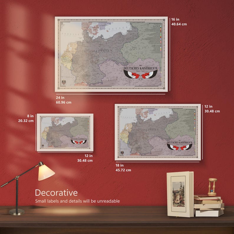 May include: Three framed historical maps of the Deutsches Kaiserreich in different sizes. The largest measures 60.96 by 40.64 cm, the medium 45.72 by 30.48 cm, and the smallest 30.48 by 20.32 cm. Each map features a central eagle emblem and text.