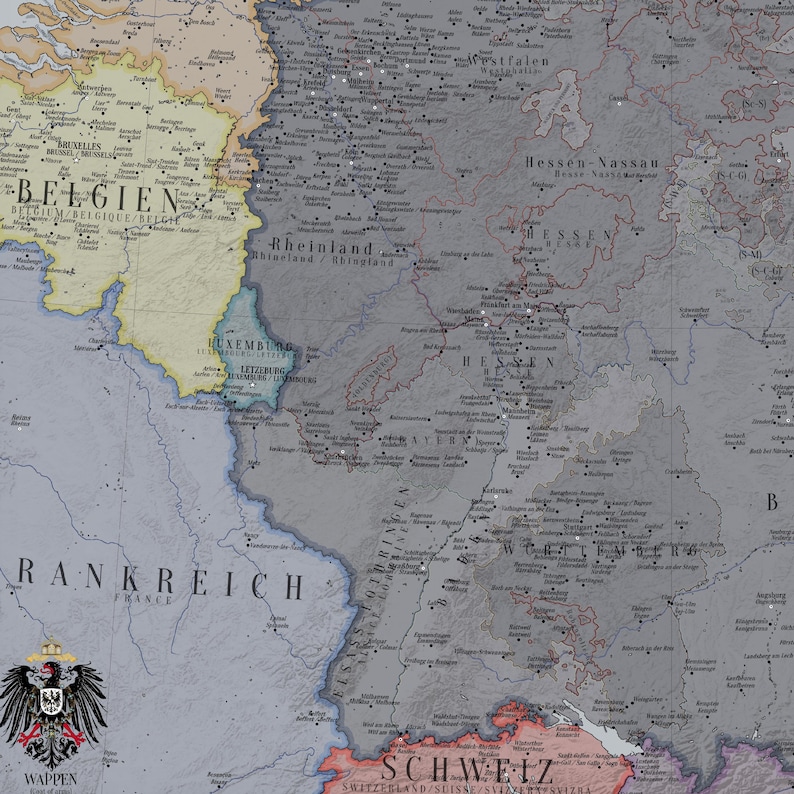 May include: A historical map showing regions of Europe including Belgium, Luxembourg, France, and parts of Germany. The map features text labels for countries and cities, a muted colour palette of grey, yellow, and pink, and a black eagle crest labelled WAPPEN.