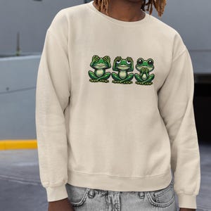 Sudadera unisex con cuello redondo y estampado de rana: no ver el mal, no escuchar el mal, no hablar el mal