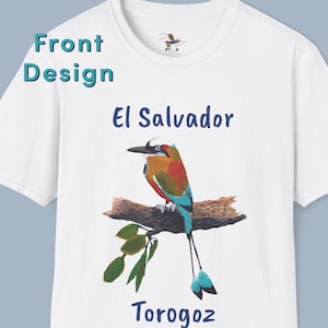May include: White t-shirt with a blue and green bird illustration, the text "El Salvador" and "Torogoz" printed on the front.