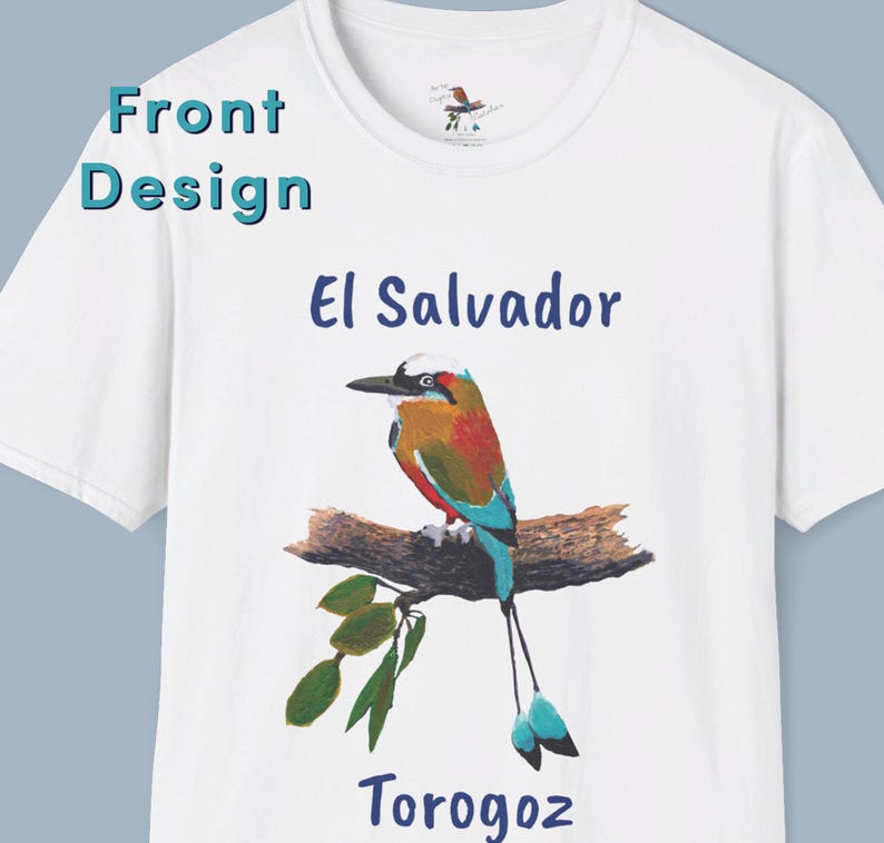 May include: White t-shirt with a blue and green bird illustration, the text "El Salvador" and "Torogoz" printed on the front.