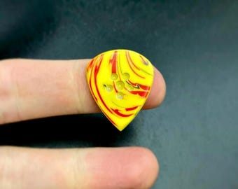 Multicolor handmade modern guitar pick made of high quality torlon and polyester resin material - Triple Layer Attack Jazz Pick by Luka
