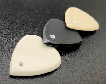 Handcrafted modern guitar pick made of high-performance plastic with glowing material jewlery for guitarist by Luka - Singular