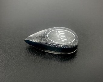 Unique handcrafted guitar pick in shape of teardrop made of high performance peek and polycarbonate material -  Triple Tear PC
