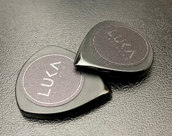 Durable handcrafted modern guitar pick made of high tech peek plastic in shape of jazz and flow jewerly for guitarist by Luka Plectrums