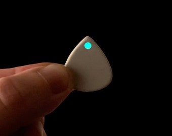 Handmade glowing guitar pick in white black beige made of high performance peek plastic gift for musician by Luka - Singular Glow