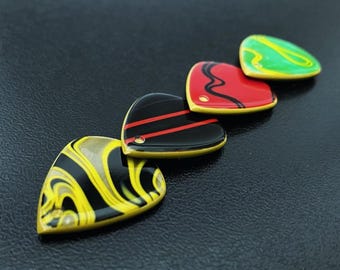 Handmade modern guitar pick made of high quality torlon and kirinite material - Triple Layer Attack Jazz Pick by Luka