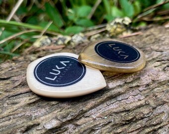 Handcrafted modern guitar pick in shape of stealth made of high performance peek and ultem material gift for musician by Luka Plectrums