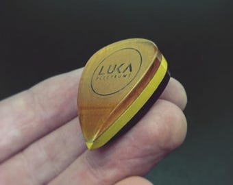 Exclusive handcrafted guitar pick in shape of teardrop made of high performance torlon and ultem material by Luka Plectrums