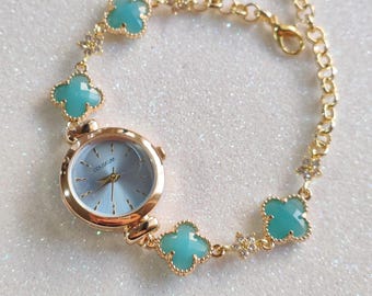 Orologio con bracciale con ciondolo floreale: stile vintage in oro 18 carati