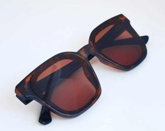 Betria Leopard Schwarz Unisex Quadratische Sonnenbrille, polarisierte Gläser, UV400, Mode Sonnenbrillen, Sonnenbrillen Brille, coole Damen Accessoires