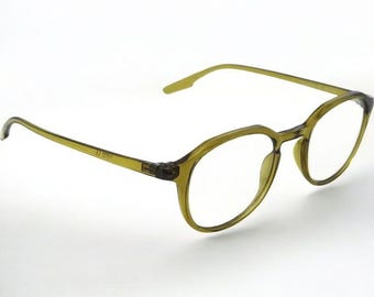 May include: Olive green plastic framed eyeglasses with round lenses.