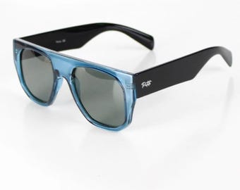 Gafas de sol unisex Delta azul claro y negro, monturas geométricas modernas, lentes polarizadas UV400, gafas de sol de moda, gafas gruesas