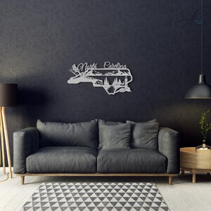 North Carolina state outline metal sign displayed in a modern living room.
