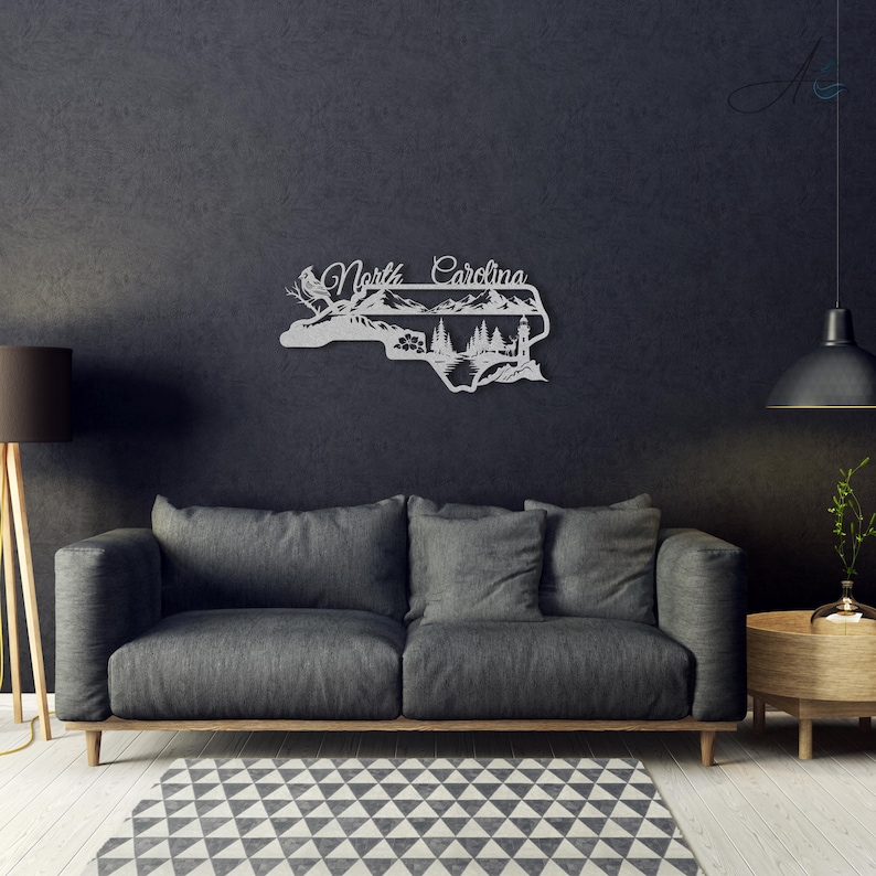 North Carolina state outline metal sign displayed in a modern living room.
