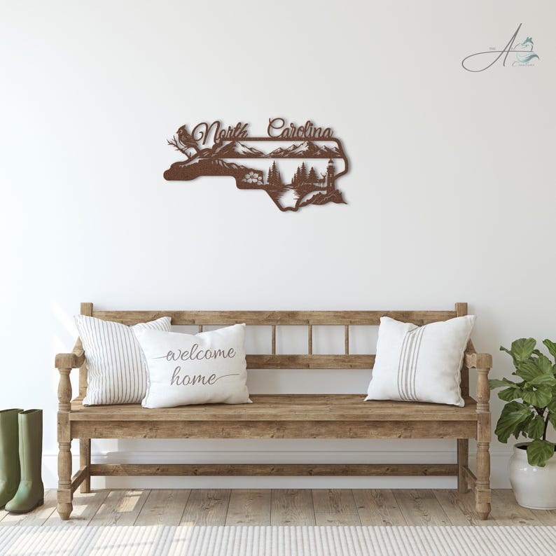 North Carolina state outline metal sign displayed in a rustic home entryway.