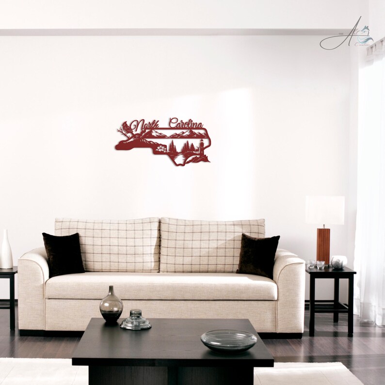 North Carolina state outline metal sign displayed in a modern living room.