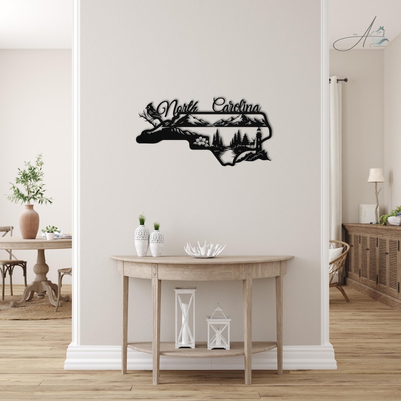 North Carolina state outline metal sign displayed in a modern home entryway.