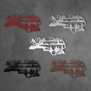 North Carolina metal sign shown in black, white, silver, red, and copper powder‑coated finishes.