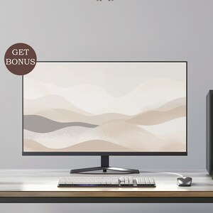 May include: A computer monitor displaying a digital art print of abstract beige and gray waves. The monitor is on a wooden desk with a keyboard and a mouse.