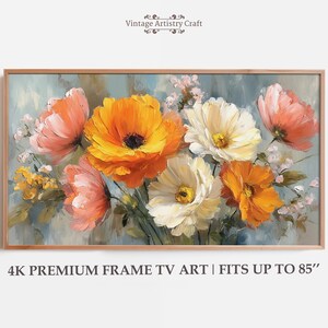 May include: A floral painting in a wooden frame features vibrant orange, white, and pink flowers against a light blue background. The artwork is labeled "Vintage Artistry Craft" and is described as "4K Premium Frame TV Art | Fits up to 85".