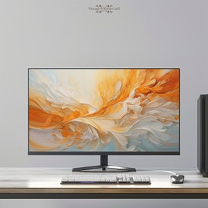 Könnte beinhalten: Ein schwarzer Computermonitor mit einem farbenfrohen abstrakten Bild auf dem Bildschirm. Der Monitor steht auf einem Holztisch mit einer weißen Tastatur und einer schwarzen Maus.