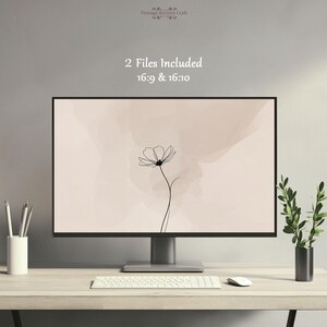 May include: A computer monitor shows a minimalist floral design on a light beige background. The image includes the text "2 Files Included 16:9 & 16:10". A keyboard, mouse, and a small plant in a vase are on the desk.