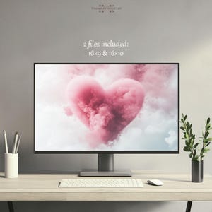 May include: A digital monitor displaying a pink heart-shaped cloud formation against a light blue sky. The text "2 files included: 16x9 & 16x10" is displayed above the monitor.