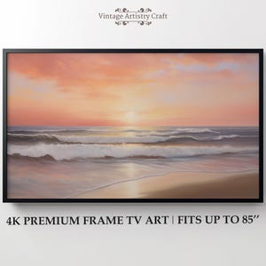 May include: A framed landscape painting of a beach scene at sunset. The sky is a blend of orange and pink hues, with the sun setting over the ocean. The waves are white and foamy, and the sand is a light tan color. Text at the bottom reads: 4K PREMIUM FRAME TV ART | FITS UP TO 85".