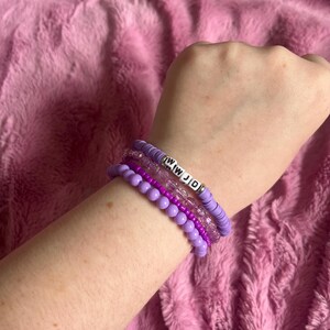 WWJD Purple 4-Stack Bracelet Set