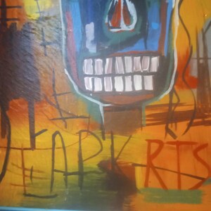 Puede incluir: Una pintura abstracta colorida con una cara de calavera azul y la palabra "ARTS" en letras rojas y negras.