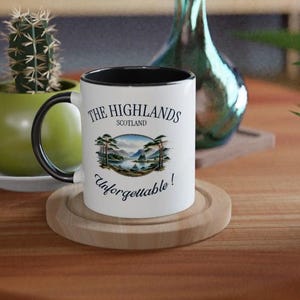 THE HIGHLANDS  &quot;Unforgettable&quot; - White 11oz Ceramic Mug with Black Interior
