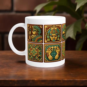 May include: White ceramic mug featuring a repeating pattern of colorful Aztec-inspired designs. The designs include figures, geometric shapes, and symbols in shades of brown, gold, green, and blue. The mug has a curved handle and a glossy finish.