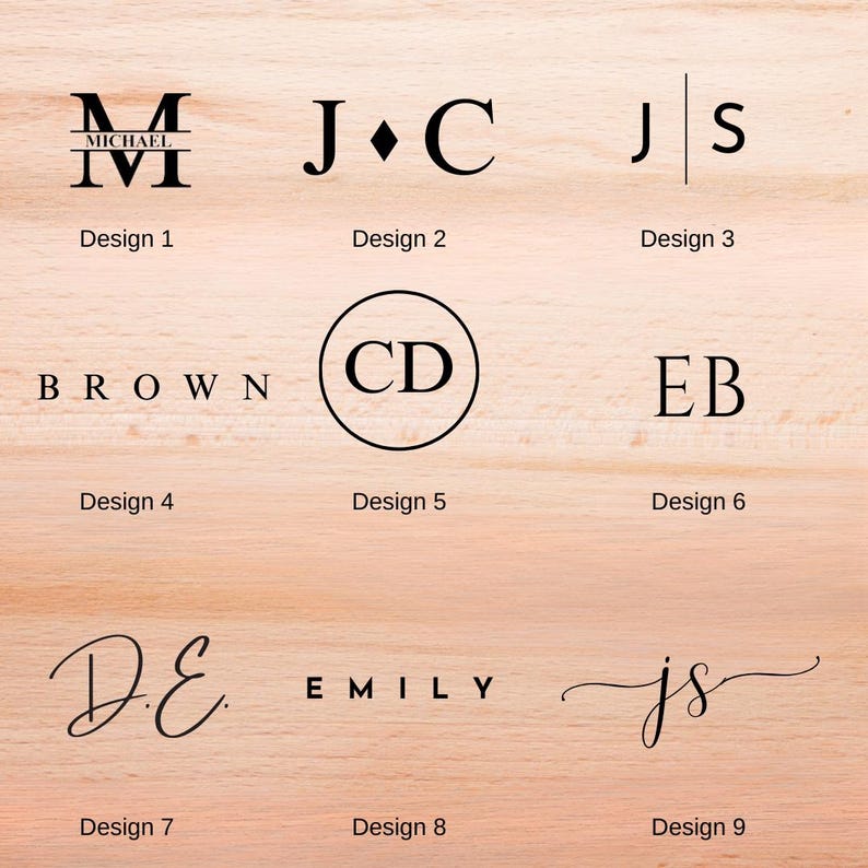 May include: Nine different monogram designs in black font are displayed on a light wood surface. The designs include initials, names, and a circular design. Each design is labeled with a number.