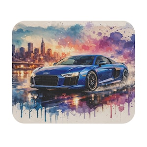 May include: Blue sports car coaster with a watercolor painting of a city skyline and a bridge in the background. The car is driving on a wet surface, creating a splash effect. The sky is a mix of orange, purple, and blue.